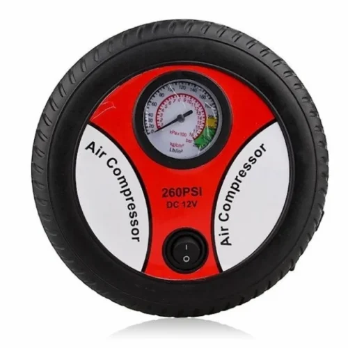 Slika prenosivog auto kompresora 12V u obliku točka, idealnog za pumpanje guma.